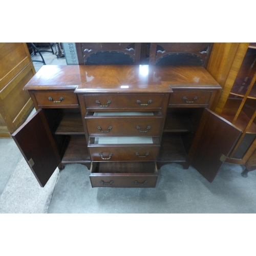 229 - A small mahogany breakfront sideboard