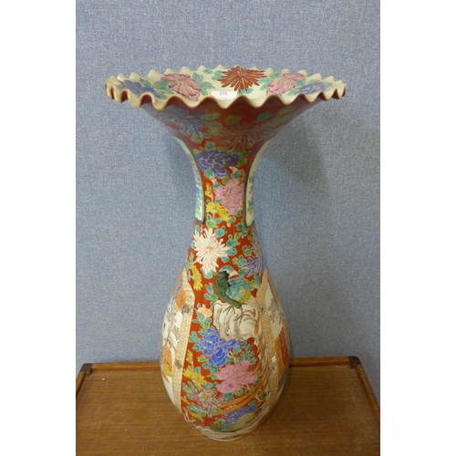 379 - A large Chinese famille rose vase, 68cms h, a/f (rim repaired)