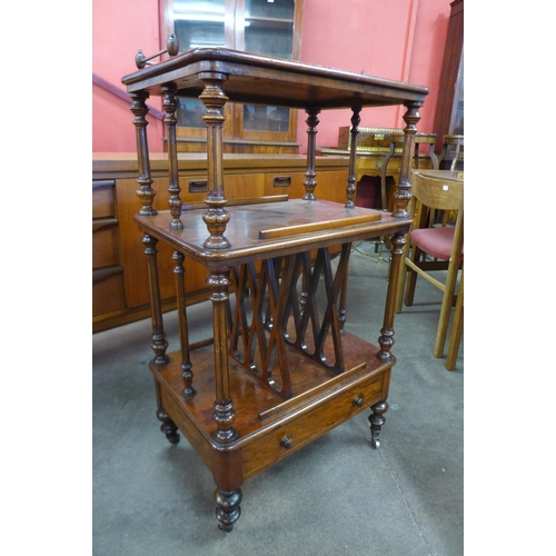 38 - A Victorian figured walnut Canterbury whatnot