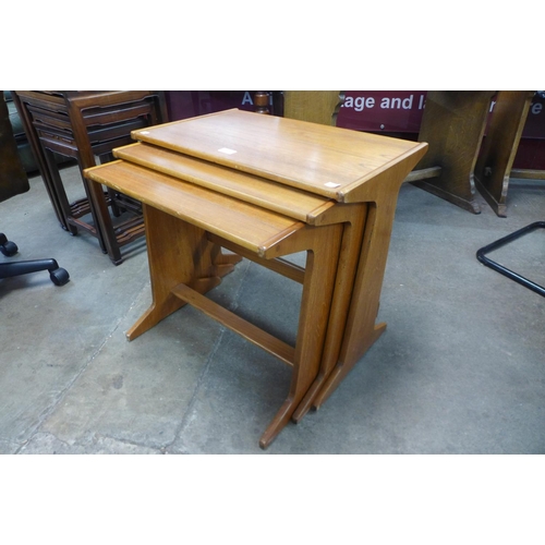 66 - A teak nest of tables