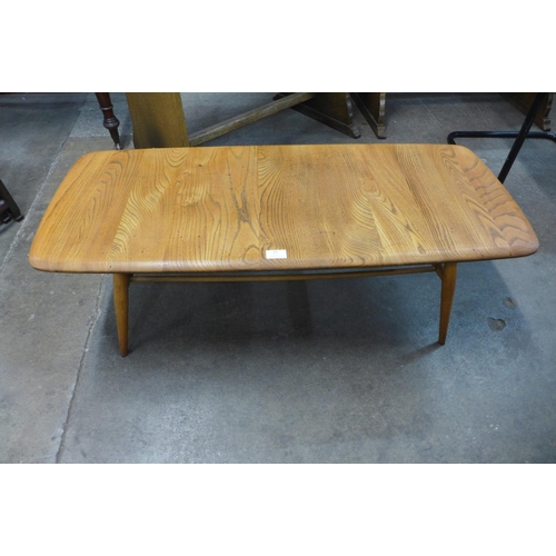 82 - An Ercol Blonde elm Windsor coffee table