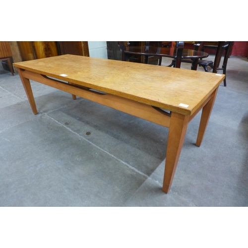 95 - A teak coffee table