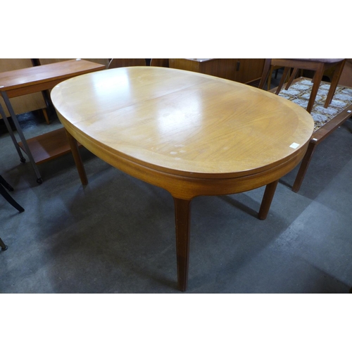 96 - A Nathan teak extending dining table