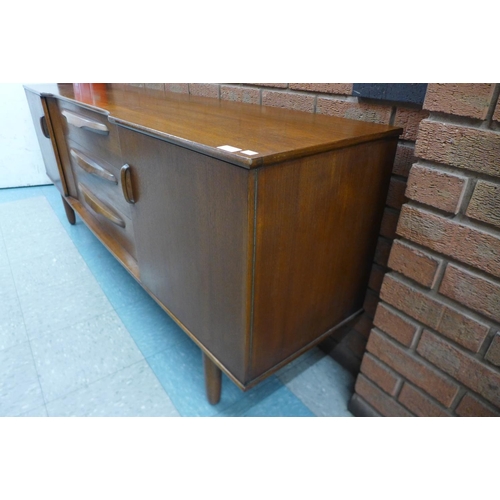 105 - A teak sideboard