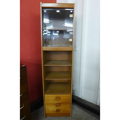 110 - A teak display cabinet
