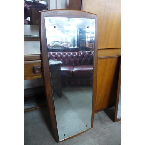 114 - A teak framed mirror