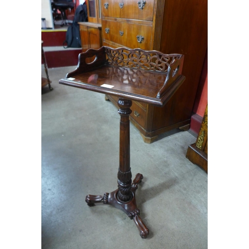 74 - A William IV style simulated rosewood bookstand