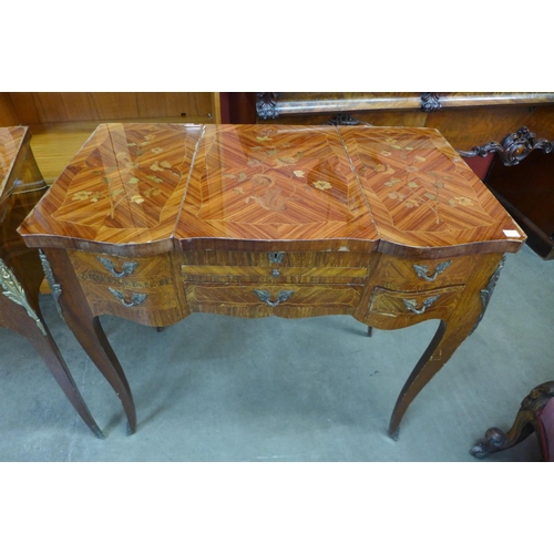 81 - A pair of French Louis XV style kingwood and marquetry effect lady's dressing tables