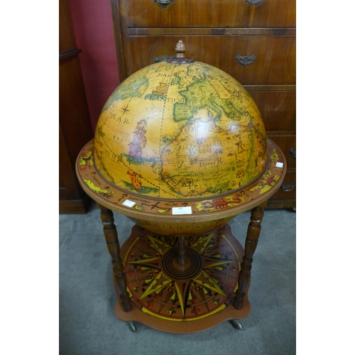 99 - A terrestrial globe cocktail cabinet