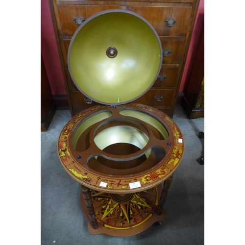 99 - A terrestrial globe cocktail cabinet