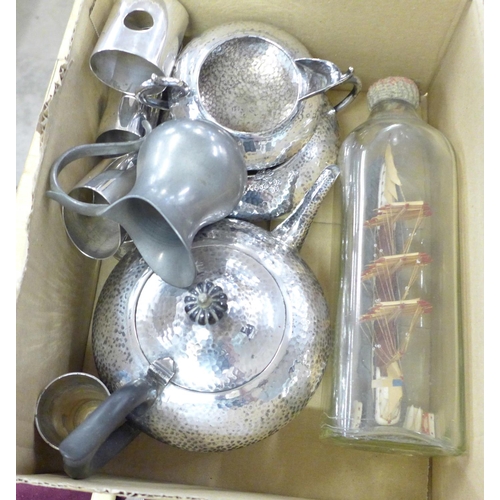 1083 - A hammered three piece plated tea service, other metalware, there books and a ship in a bottle **PLE... 