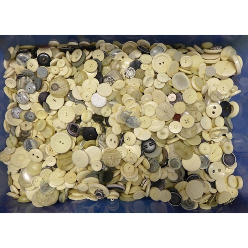 1084 - A blue plastic container of thousands of cream and other buttons **PLEASE NOTE THIS LOT IS NOT ELIGI... 