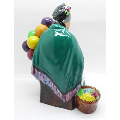 605 - A Royal Doulton figure, The Old Balloon Seller