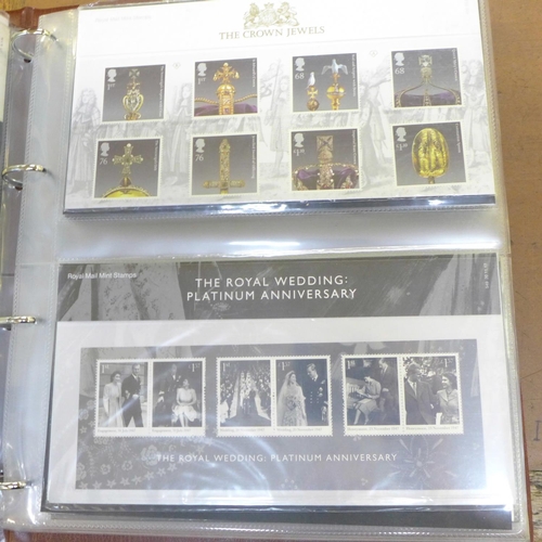 668 - Stamps; GB Royal Mail mint presentation packs in Royal Mail album, face value exceeds £100