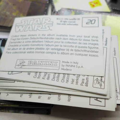 669 - Star Wars; a box of Merlin's Trilogy Collection Movie Trading Cards, 49 packets plus one opened, 5 c... 