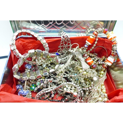 708 - Costume jewellery including a silver bangle and chain with pendant