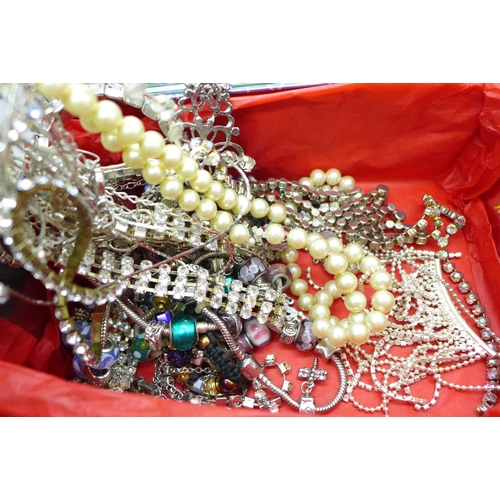 708 - Costume jewellery including a silver bangle and chain with pendant