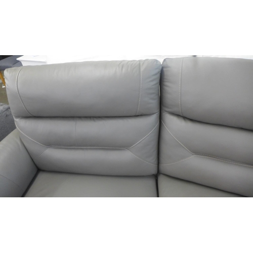 1553 - A Raffa grey leather electric reclining four seater sofa