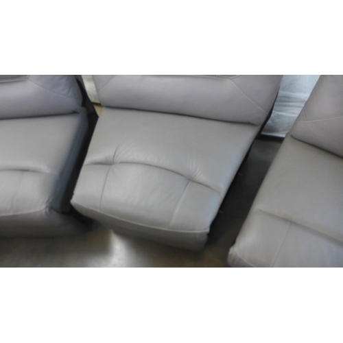 1553 - A Raffa grey leather electric reclining four seater sofa