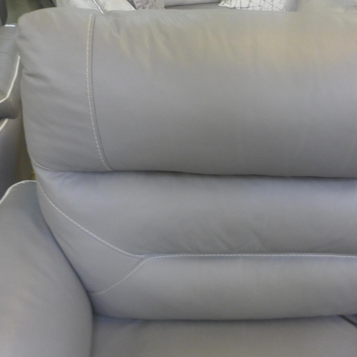 1556 - A Raffa grey leather electric reclining loveseat ( mark to back)