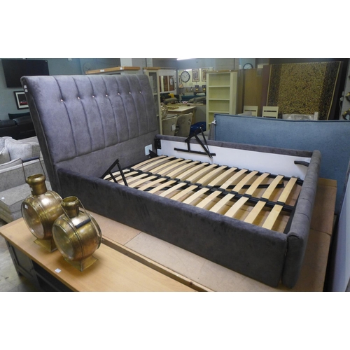 1578 - A grey upholstered kingsize button-back storage bedframe (tear to corner, incomplete)