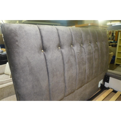 1578 - A grey upholstered kingsize button-back storage bedframe (tear to corner, incomplete)