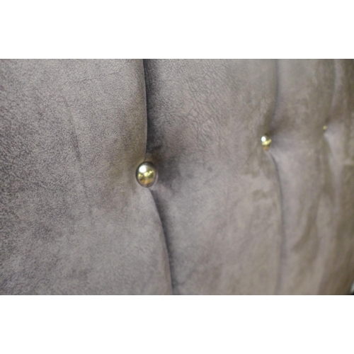 1578 - A grey upholstered kingsize button-back storage bedframe (tear to corner, incomplete)