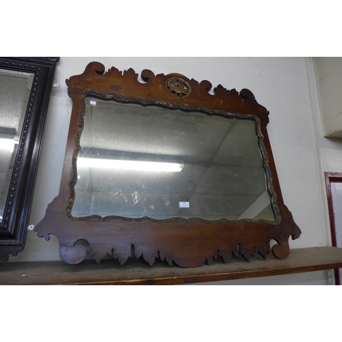 388 - A George II mahogany and parcel gilt framed mirror