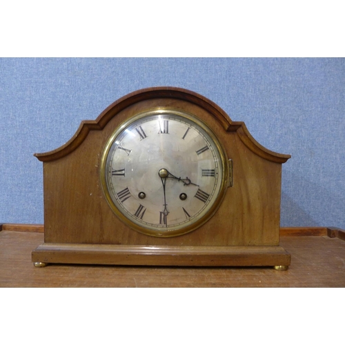 395 - A mahogany mantel clock and an oak wall clock