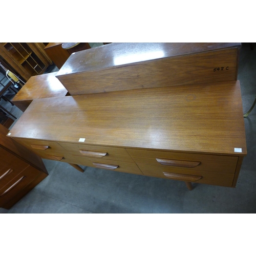 74 - A teak sideboard