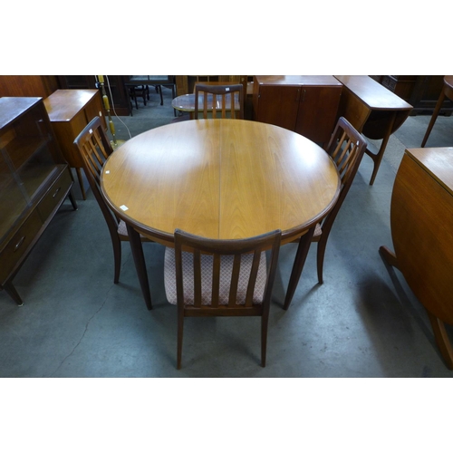 77 - A G-Plan Fresco teak extending dining table and four chairs