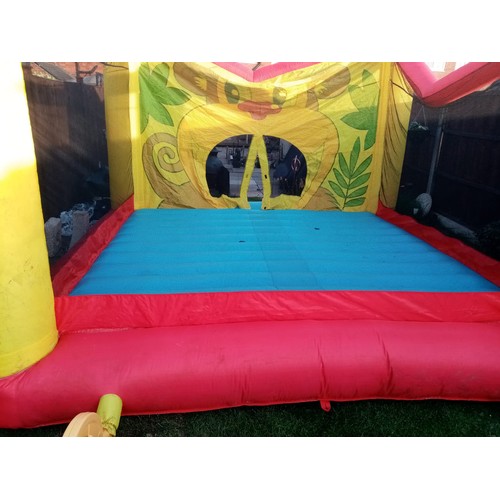 2441 - 12 x 12ft Red and Yellow Inflatable bouncy castle with 2 blowers - both working