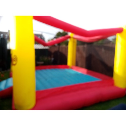 2441 - 12 x 12ft Red and Yellow Inflatable bouncy castle with 2 blowers - both working