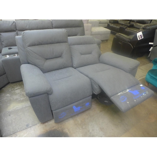 1550 - A Kuka fabric two seater sofa with power recling, RRP £666.66 + vat ( 4057-10 ) * this lot is subjec... 