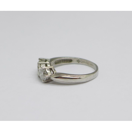 1297 - A platinum set three stone diamond ring, 6g, size P/Q, over 1 carat total weight diamond