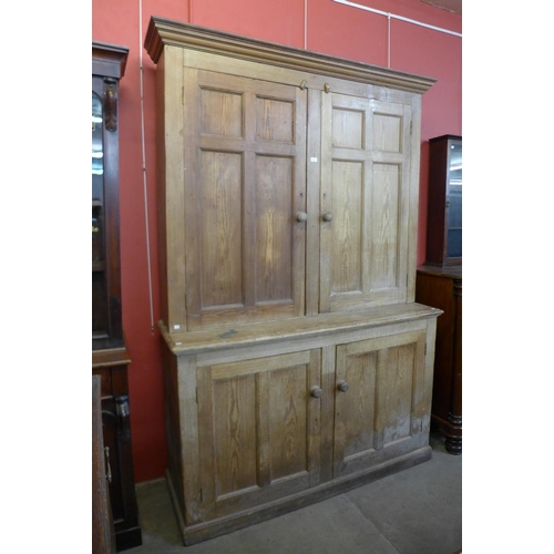 1 - A Victorian pine housekeeper's cupboard, 237cms h, 158cms w, 51cms d