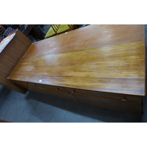 102 - A teak sideboard