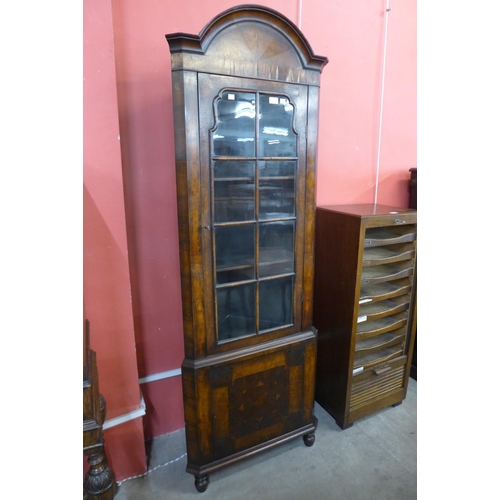 11 - A Queen Anne style oyster veneered walnut freestanding corner cabinet