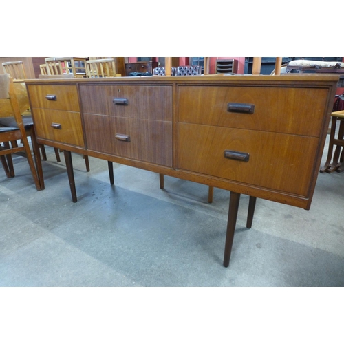 111 - A teak and afromosia sideboard