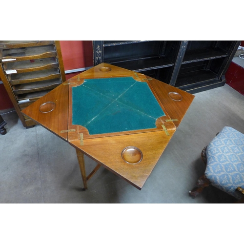 12 - An Edward VII mahogany envelope card table, stamped W. Walker & Sons, Bunhill Row, London E.C.