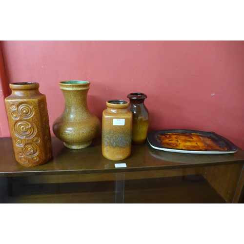 121 - Four West German vases and a Cornish glazed tray