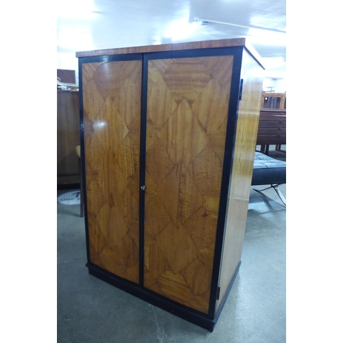 129 - Aa Art Deco ebonised and satin birch music cabinet