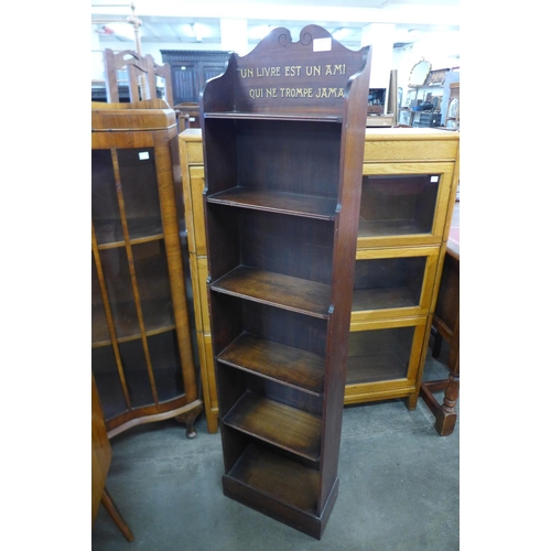 133 - An early 20th Century slim mahogany open bookcase