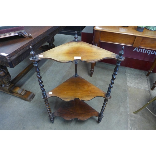 34 - A Victorian rosewood barleytwist three tier corner whatnot