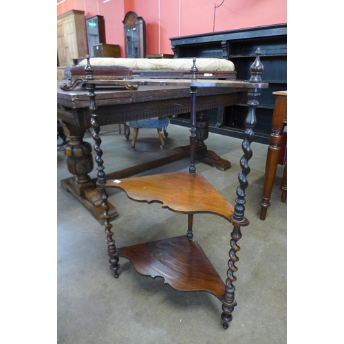 34 - A Victorian rosewood barleytwist three tier corner whatnot