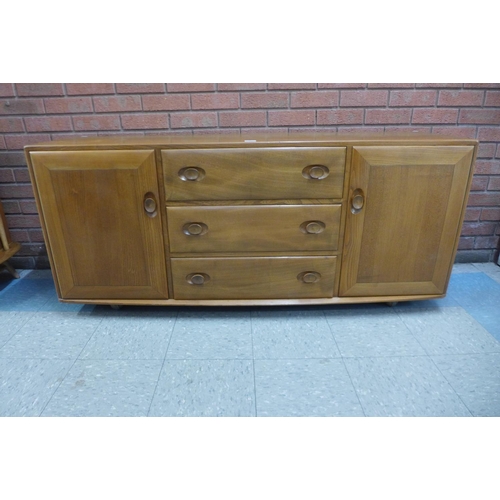 40 - An Ercol Blonde elm 455 model Windsor sideboard