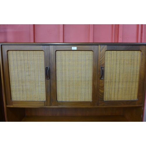 50 - A G-Plan Fresco teak and rattan highboard