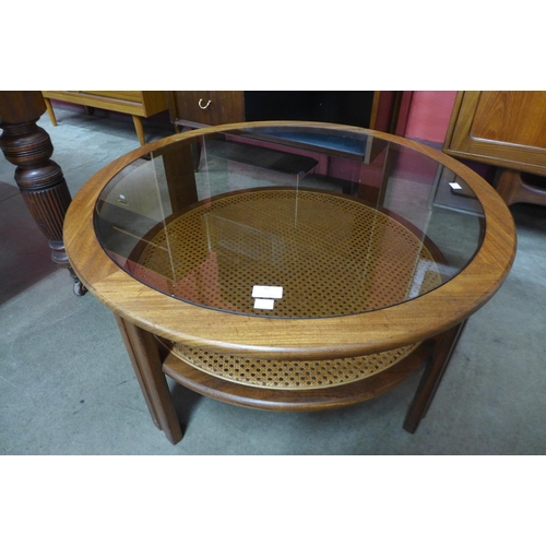 51 - A G-Plan teak, rattan and glass topped coffee table