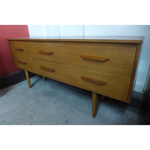 56 - A teak sideboard