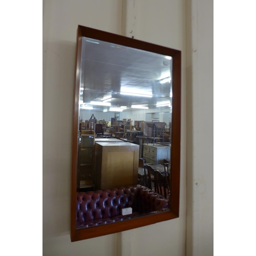 63 - A teak framed mirror